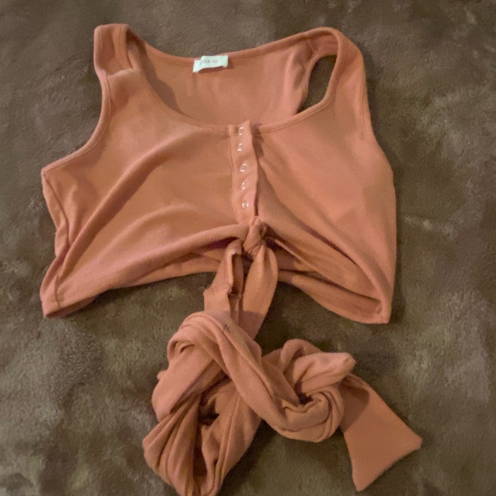 Better be crop top with tie at bottom size medium